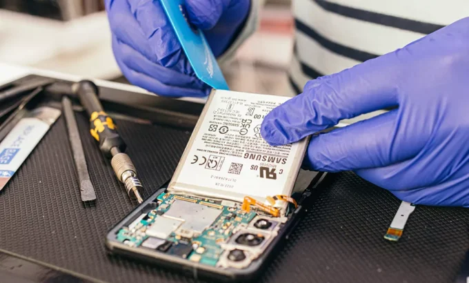 Samsung Galaxy phone being repaired on a workbench at iTech Norwich