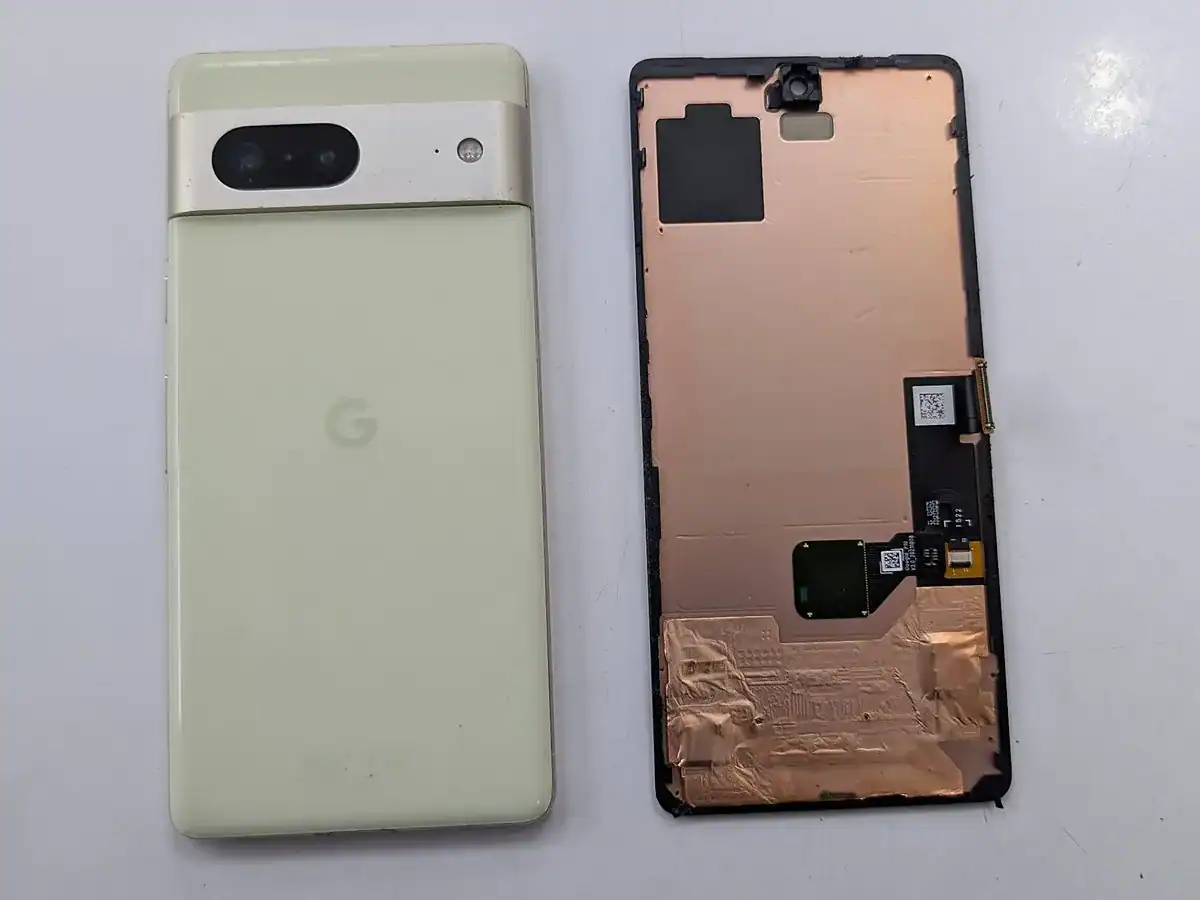 Pixel 7 opened at iTech Norwich showing the under-display fingerprint sensor on the back of the screen